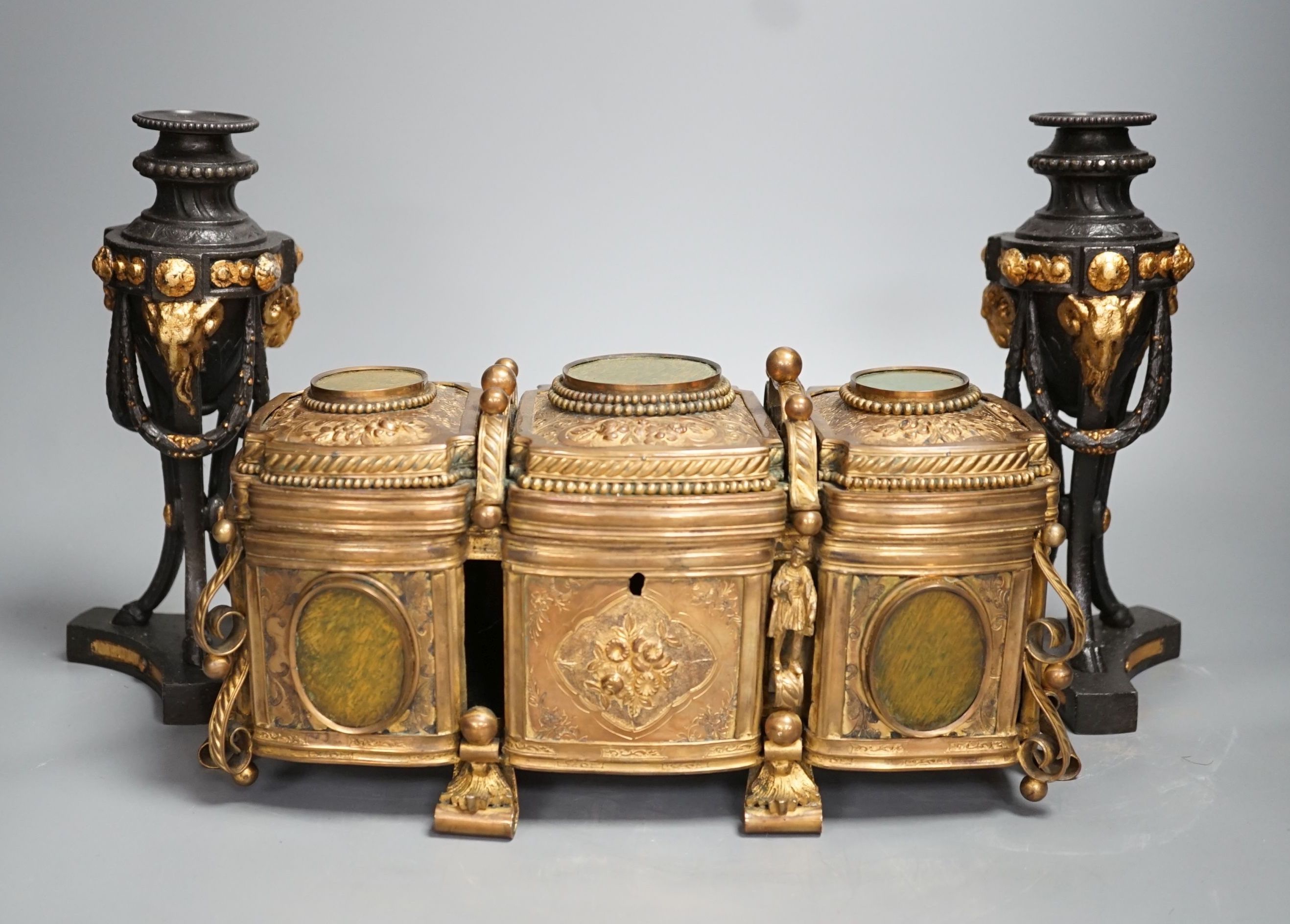 A French gilt metal casket inset with reverse painted glass panels and a pair of ormolu style candlesticks, 22.5cm tall